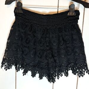 Stela lude size S. Black lace shorts. High waisted.